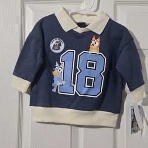 NWT Bluey sweatshirt with number 18 graphic.